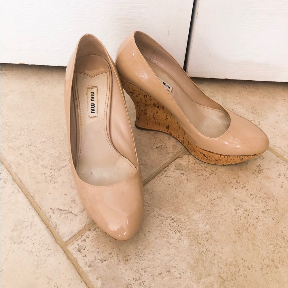 Cream colored Miu Miu wedge shoes